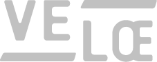 Harmaa "VELOE" -teksti mustalla taustalla, jossa on moderni ja tyylitelty fontti.